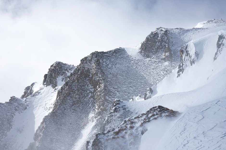 High mountain peaks covered in snow, showcasing winter's beauty.